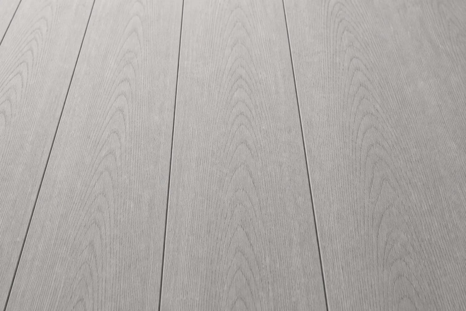 Monochrome close view across wide French oak floorboards