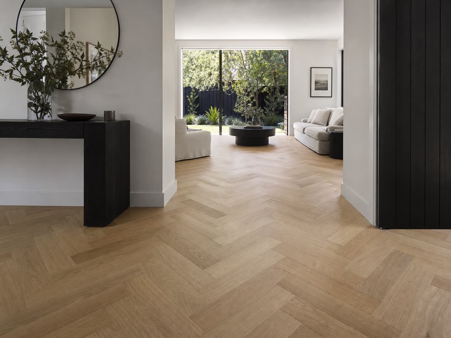 Generated concept of natural oak herringbone flooring in a residential interior, not a completed Alpine Woods Flooring project