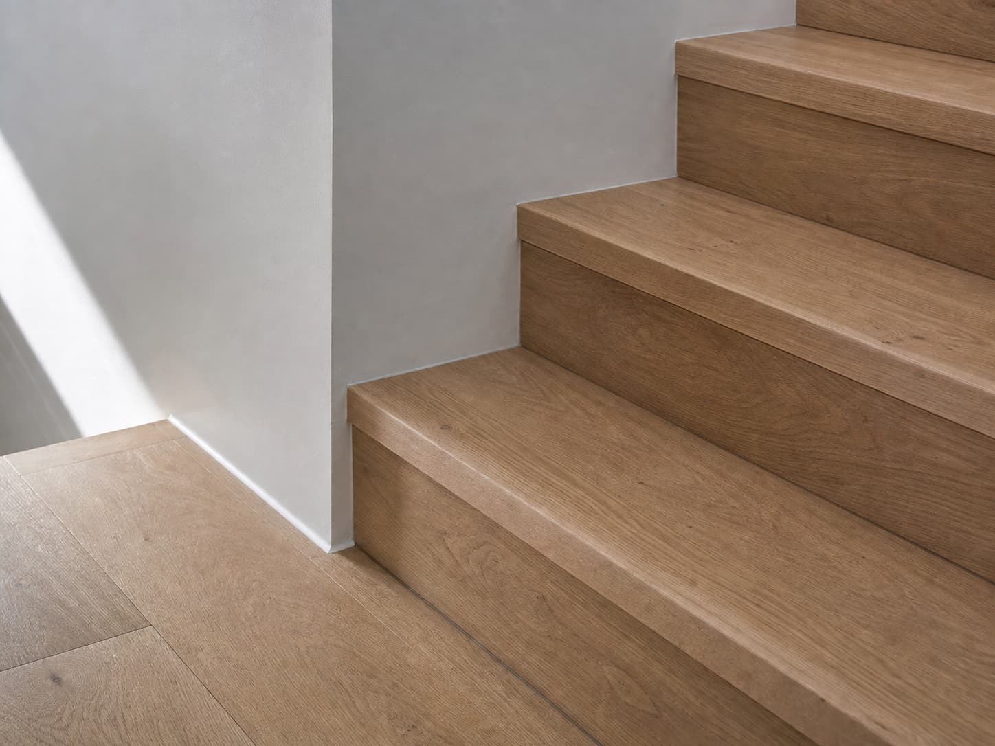 Generated concept showing custom timber stair nosing detail, not a completed Alpine Woods Flooring project