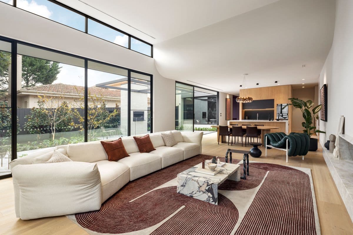 Wide view of Avoca Bay engineered oak flooring across a Kew open-plan interior.