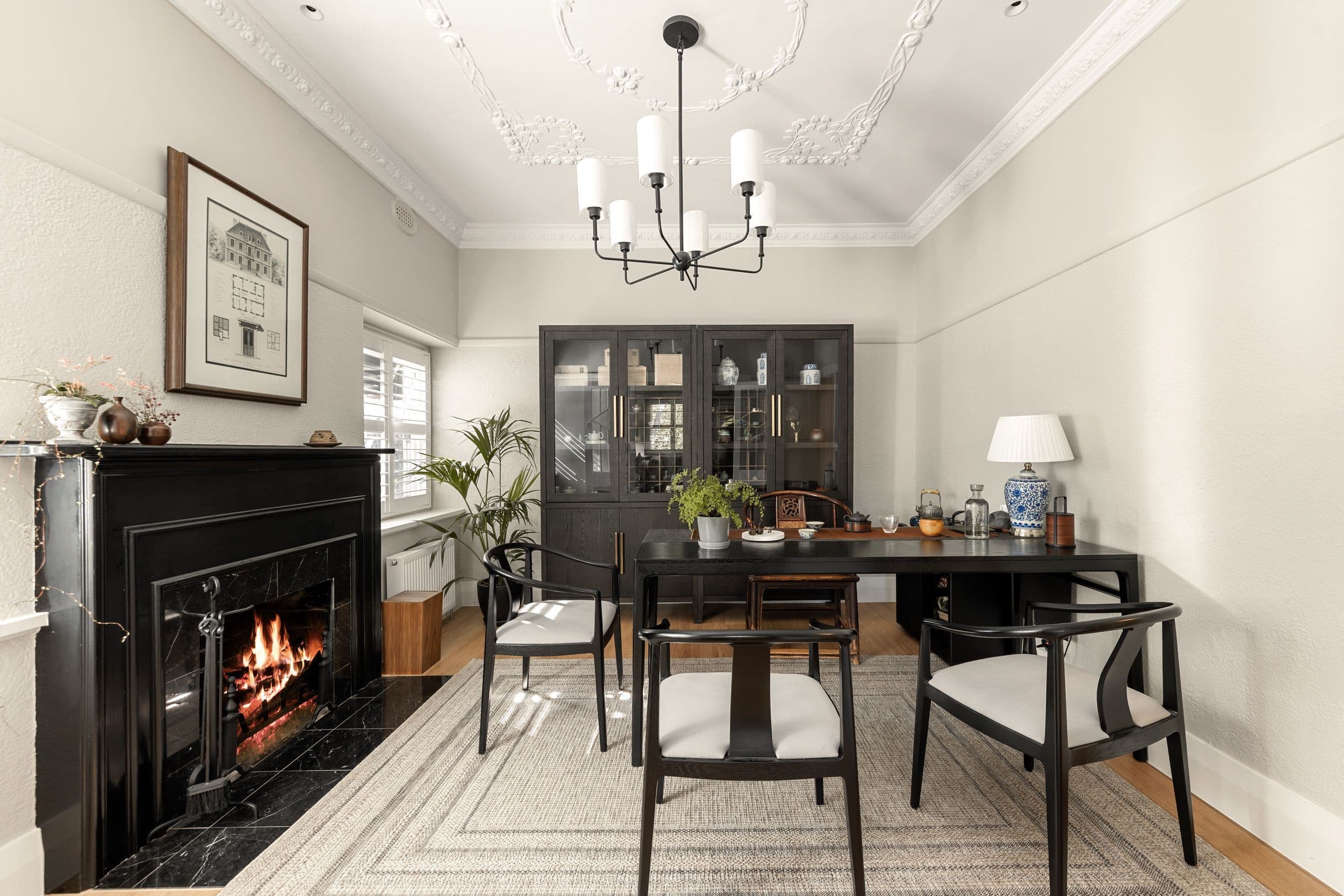 Chesterfield oak flooring in a Canterbury dining room with dark fireplace.