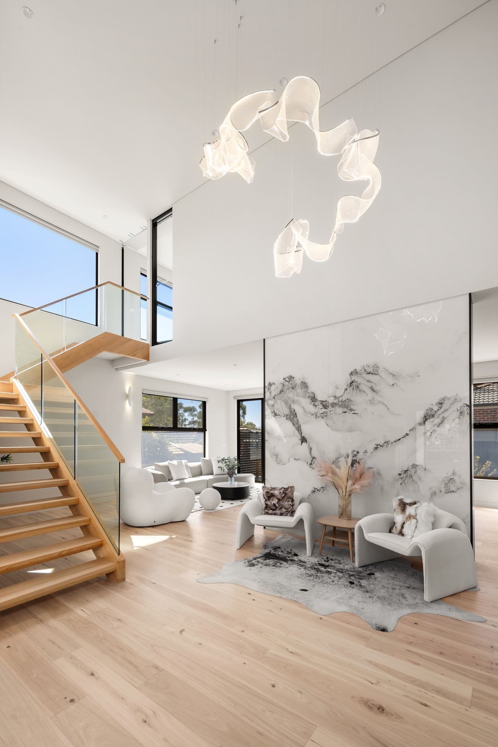 Danehill Hickory flooring across an open Wheelers Hill living area and staircase.