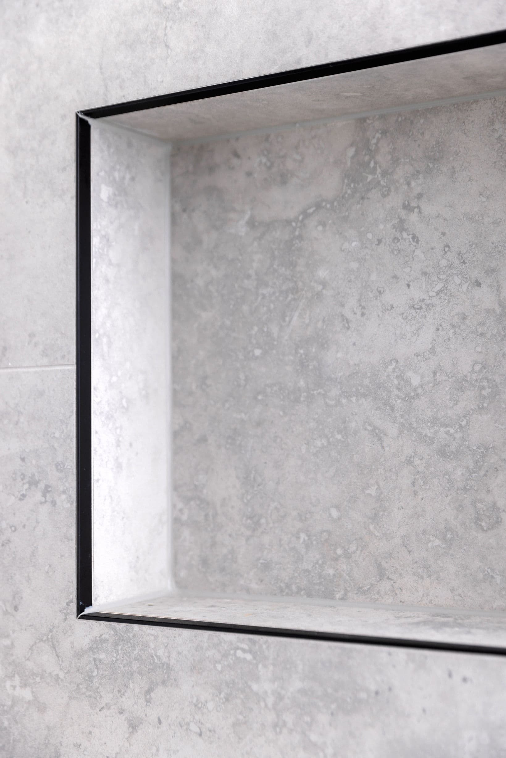 Recessed bathroom shelf detail in the completed Glen Iris residence.